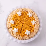 Overhead view of Pumpkin Pie Rice Krispie Treats sliced into six wedges.