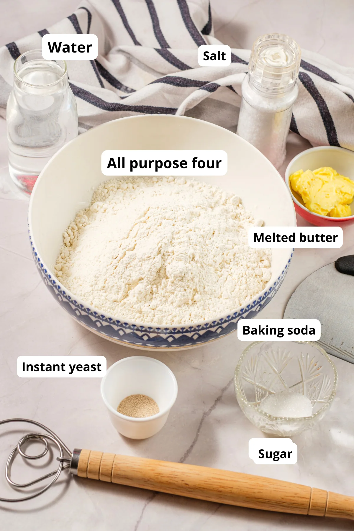 Flour, water, butter, yeast, sugar, salt, and baking soda for homemade pretzel bites.