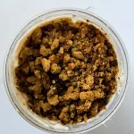 Toasted crumbled blondies topping a caramel milkshake